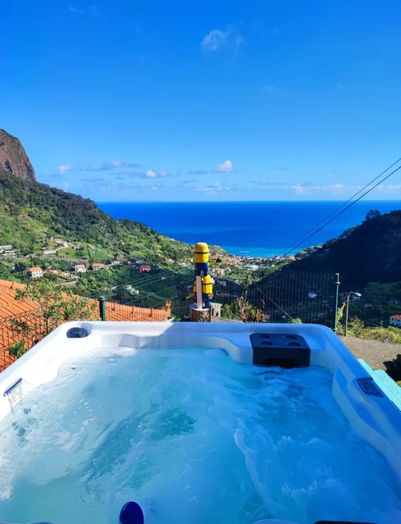 Outdoor jacuzzi at Villa da Rochinha with sea view
